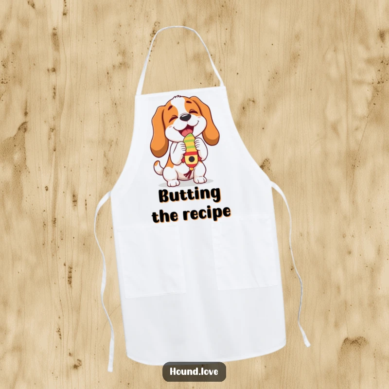 Funny hound character joyfully butting a dangling, wiggling toy, bringing humor and personality to this practical kitchen apron.