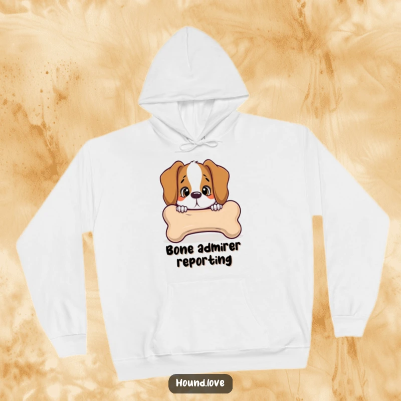 Funny hound peeking with curiosity from behind a giant, talking bone, on a cozy hoodie, perfect for humor and warmth.