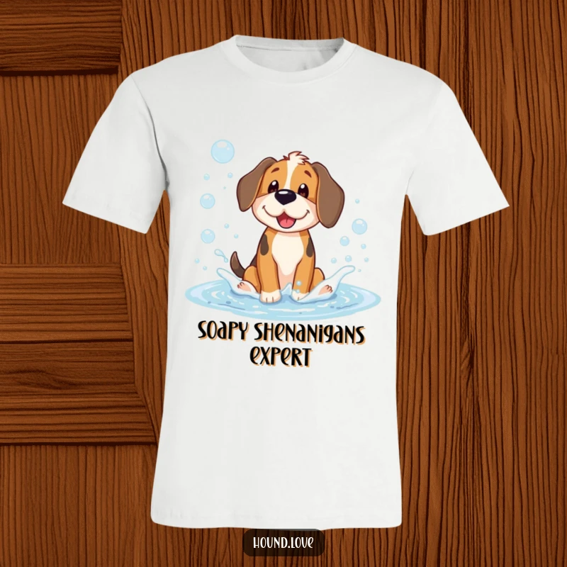 Funny t-shirt featuring a gleeful hound dog character splashing enthusiastically in a large puddle filled with iridescent soap bubbles.